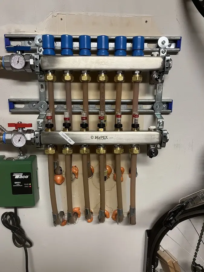 Plumber performing Gas Line Installation at a residential property in Litchfield